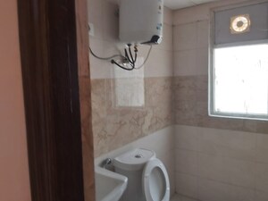 Bathroom in 3 BHK Apartment at Amrapali Golf Homes, Sector 4 Greater Noida – for Sale