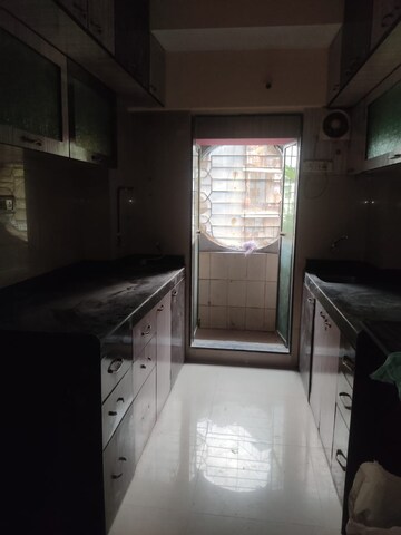 Kitchen in 2 BHK Apartment at Gaurav Paradise, Mira Road – for Rent