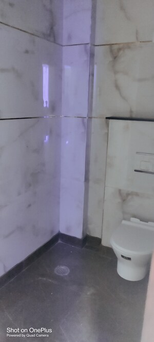 Bathroom in 2 BHK Apartment at Rohini Sector 13 – for Sale