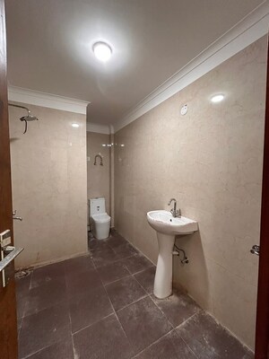 Bathroom in 3 BHK Builder Floor at RWA Tomar Colony, Mukundpur – for Sale