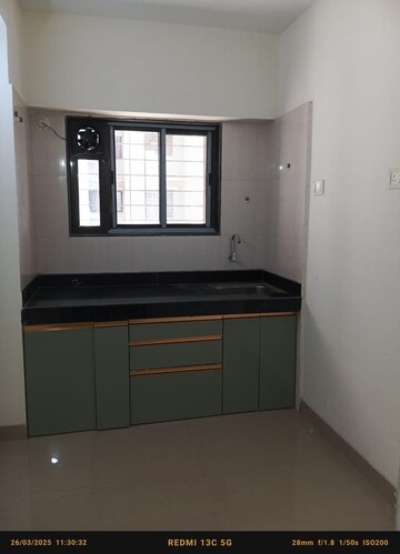 Kitchen in 1 BHK Apartment at Mhada Sector R3, Goregaon West – for Rent