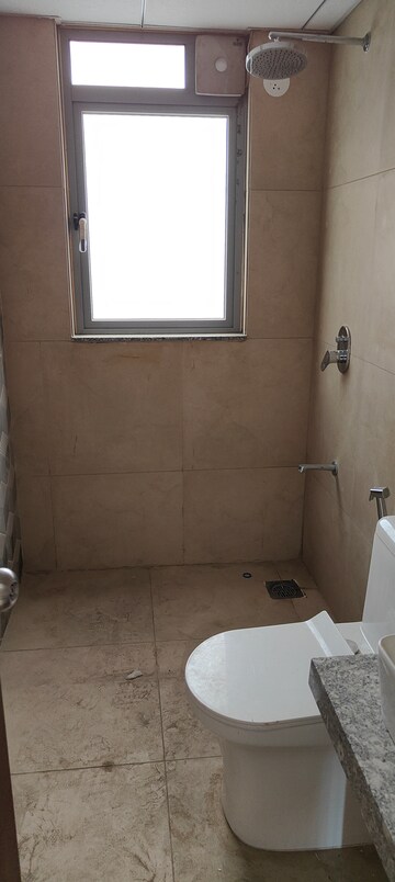 Bathroom in 2 BHK Apartment at Kalpataru Immensa, Kolshet Road – for Rent