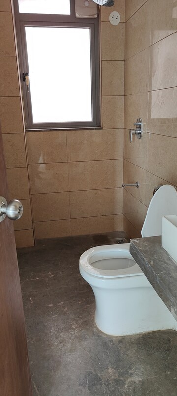 Bathroom in 2 BHK Apartment at Kalpataru Immensa, Kolshet Road – for Rent