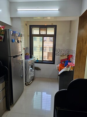 Kitchen in 2 BHK Apartment at Shanti Gardens , Mira Road – for Sale
