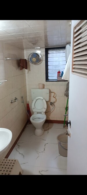 Bathroom in 2 BHK Apartment at Hit Niketan CHS, Bhandup West – for Sale