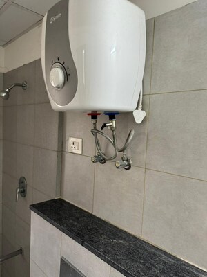 Bathroom in 3 BHK Apartment at Cosmos Express 99, Sector 99 – for Sale