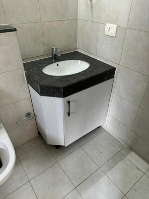 Bathroom in 3 BHK Apartment at Cosmos Express 99, Sector 99 – for Sale