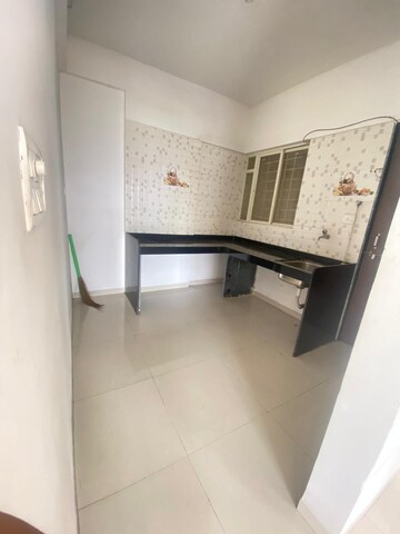 Kitchen in 2 BHK Apartment at Somani Residency, Punawale – for Rent