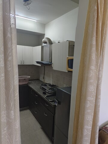 Kitchen in 2.5 BHK Apartment at RG Residency, Sector 120 – for Rent
