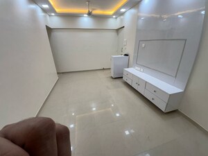 Living Room in 1.5 BHK Apartment at Sai Abhishek CHS, Goregaon East – for Sale