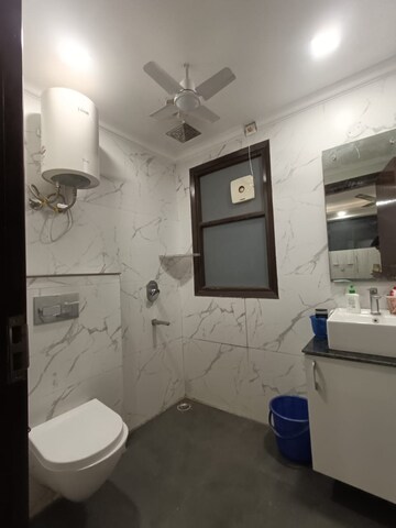 Bathroom in 4 BHK Builder Floor at Ansal Sushant Lok I, Sector 43 – for Rent