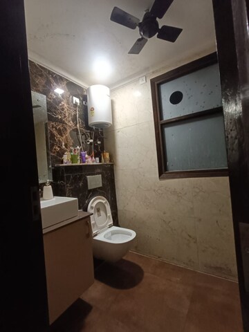 Bathroom in 4 BHK Builder Floor at Ansal Sushant Lok I, Sector 43 – for Rent