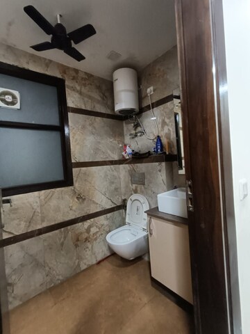 Bathroom in 4 BHK Builder Floor at Ansal Sushant Lok I, Sector 43 – for Rent