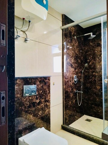 Bathroom in 4 BHK Builder Floor at Ansal Sushant Lok I, Sector 43 – for Rent