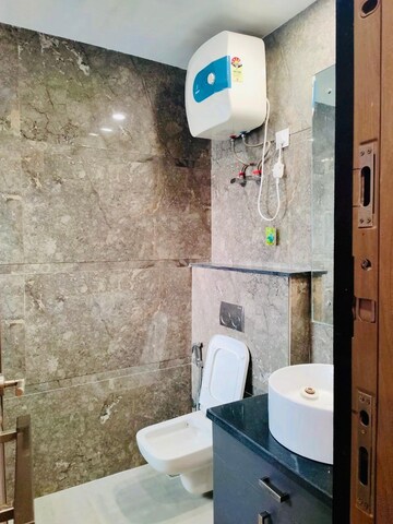 Bathroom in 4 BHK Builder Floor at Ansal Sushant Lok I, Sector 43 – for Rent