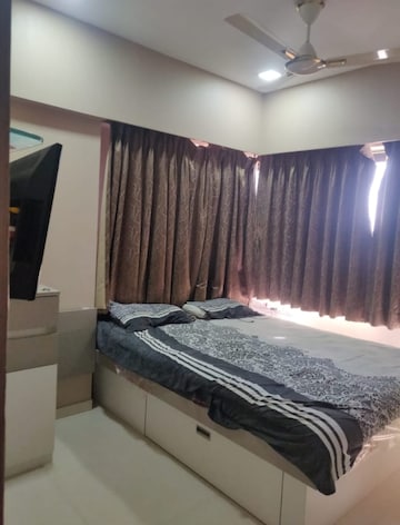 Bedroom in 2 BHK Apartment at Kanakia Rainforest, Andheri East – for Rent
