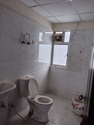 Bathroom in 3 BHK Apartment at MGI Gharaunda, Raj Nagar Extension – for Sale