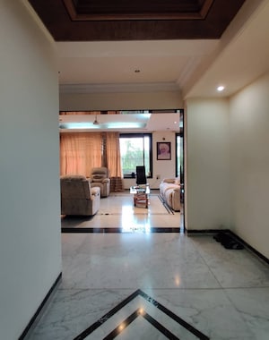 Master Bedroom in 4 BHK Apartment at Mandar CHS	Juhu, Juhu – for Sale
