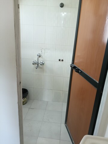 Bathroom in 1 BHK Apartment at Dheeraj Pooja, Malad West – for Rent