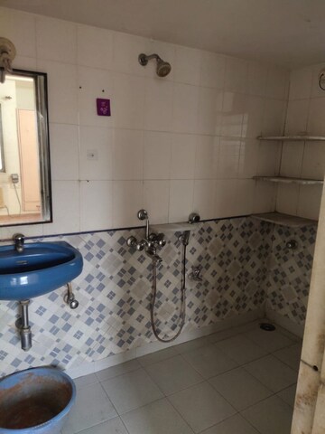 Bathroom in 2 BHK Apartment at Sudarshan Sky Garden, Ghodbunder Road – for Rent