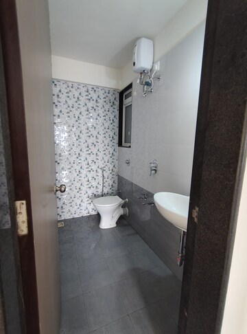 Bathroom in 2 BHK Apartment at Mahavir Kalpavruksha, Ghodbunder Road – for Rent