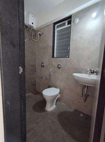 Bathroom in 2 BHK Apartment at Mahavir Kalpavruksha, Ghodbunder Road – for Rent