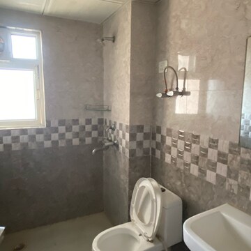 Bathroom in 3 BHK Apartment at Gardenia Golf City, Noida Central – for Rent