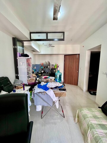 Living Room in 1 BHK Apartment at Lodha Crown Quality Homes, Majiwada – for Sale