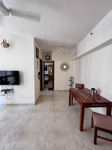 Living Room in 1.5 BHK Apartment at Lodha Amara, Kolshet Road – for Sale