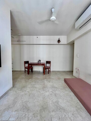 Living Room in 1.5 BHK Apartment at Lodha Amara, Kolshet Road – for Sale