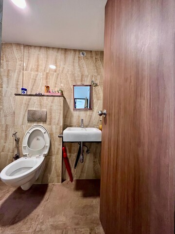 Bathroom in 1.5 BHK Apartment at Lodha Amara, Kolshet Road – for Sale