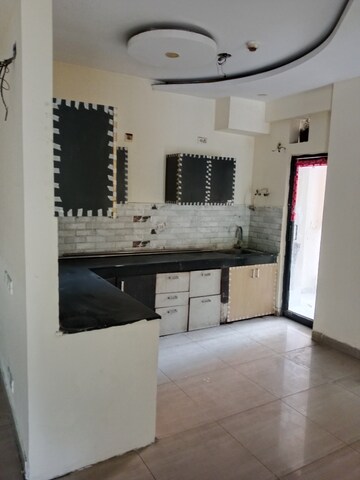 Kitchen in 3 BHK Apartment at Raj Nagar Extension – for Rent