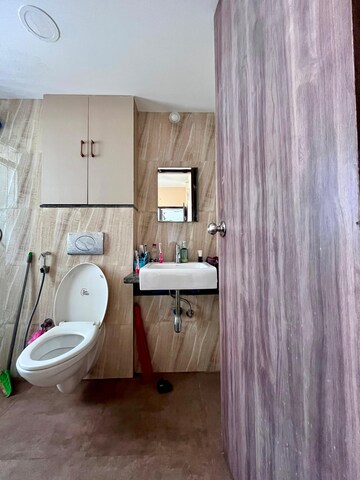 Bathroom in 1.5 BHK Apartment at Lodha Amara, Kolshet Road – for Sale