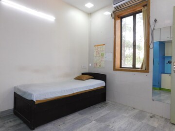 Bedroom in 2 BHK Apartment at Brothers CHS, Mahim – for Rent