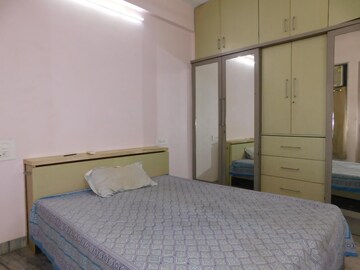 Bedroom in 2 BHK Apartment at Brothers CHS, Mahim – for Rent
