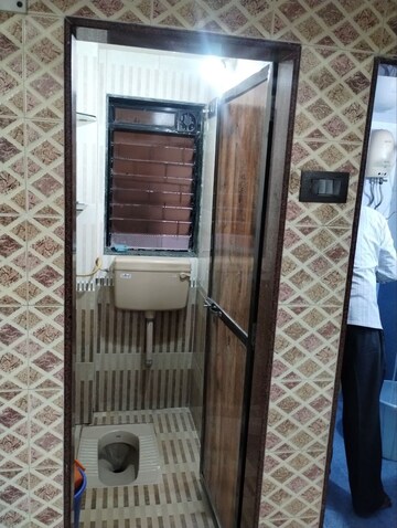 Living Room in 2 BHK Apartment at Cliff End CHS, Andheri East – for Rent