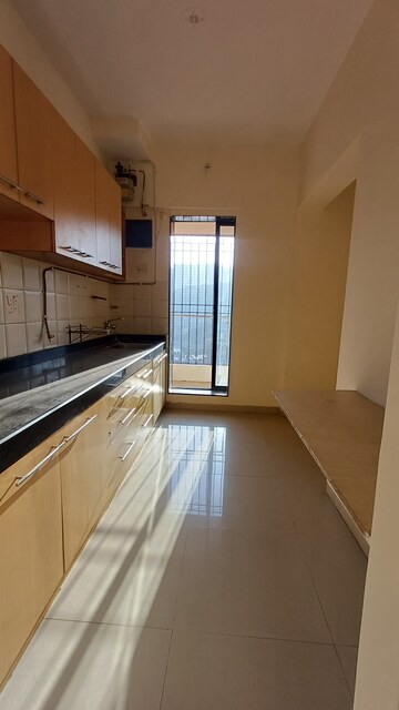 Kitchen in 2 BHK Apartment at Raunak Paradise, Kokanipada – for Rent