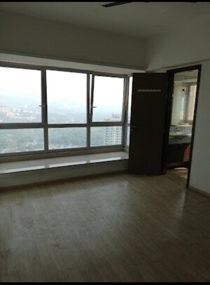 Master Bedroom in 2 BHK Apartment at DB Orchid Woods, Goregaon East – for Sale