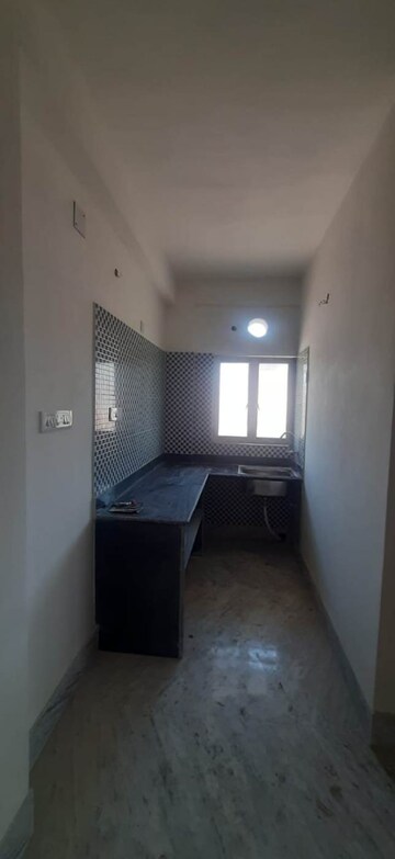 Kitchen in 2 BHK Apartment at Purba Barisha – for Sale