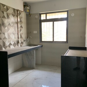 Kitchen in 2 BHK Apartment at Kastur Park – for Sale