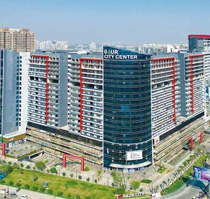 Living Room in Studio Apartment at Gaur City Center, Sector 4 Greater Noida – for Sale