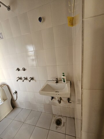 Bathroom in 1.5 BHK Apartment at Uma Cooperative Society, Mayur Vihar 1 – for Rent