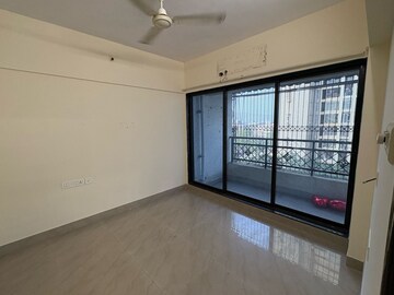 Bedroom in 2 BHK Apartment at Tulsi Aura Mumbai, Ghansoli – for Rent