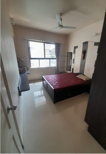 Bedroom in 2 BHK Apartment at Dorabjee Paradise Building A&B Condominium, Mohammadwadi – for Rent