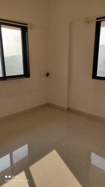 Master Bedroom in 1 BHK Apartment at Raunak Delight, Owale – for Rent