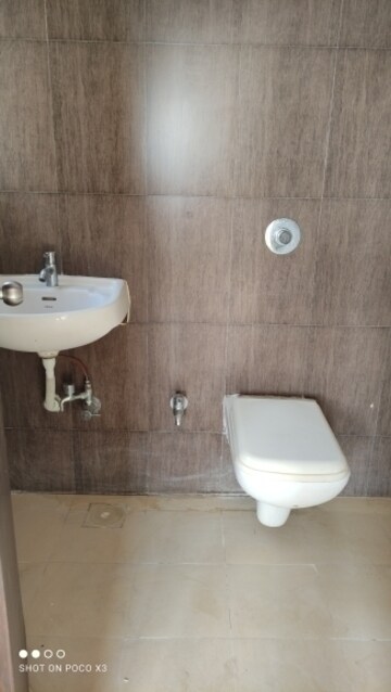 Bathroom in 1 BHK Apartment at Raunak Delight, Owale – for Rent