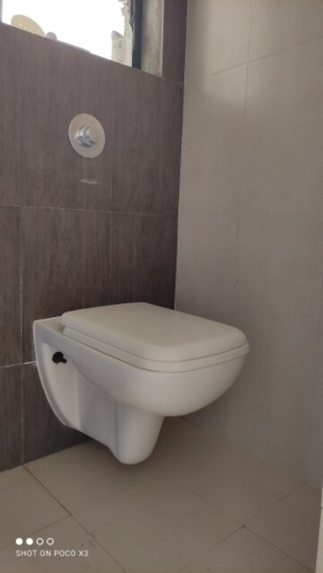 Bathroom in 1 BHK Apartment at Raunak Delight, Owale – for Rent