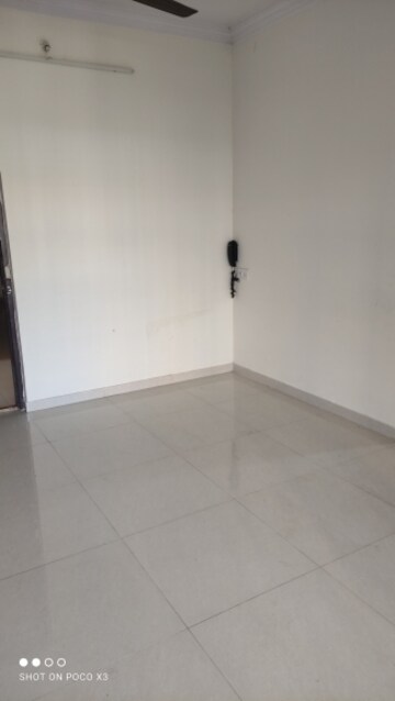 Master Bedroom in 1 BHK Apartment at Raunak Delight, Owale – for Rent