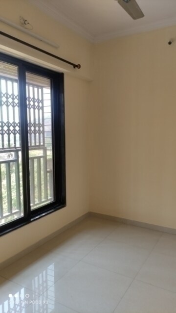 Master Bedroom in 1 BHK Apartment at Raunak Delight, Owale – for Rent