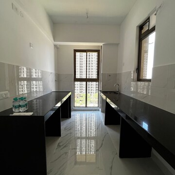 Kitchen in 1.5 BHK Apartment at Raymond Ten X Habitat, Swastik Garden – for Sale